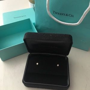 Tiffany & Co earrings.   Gold